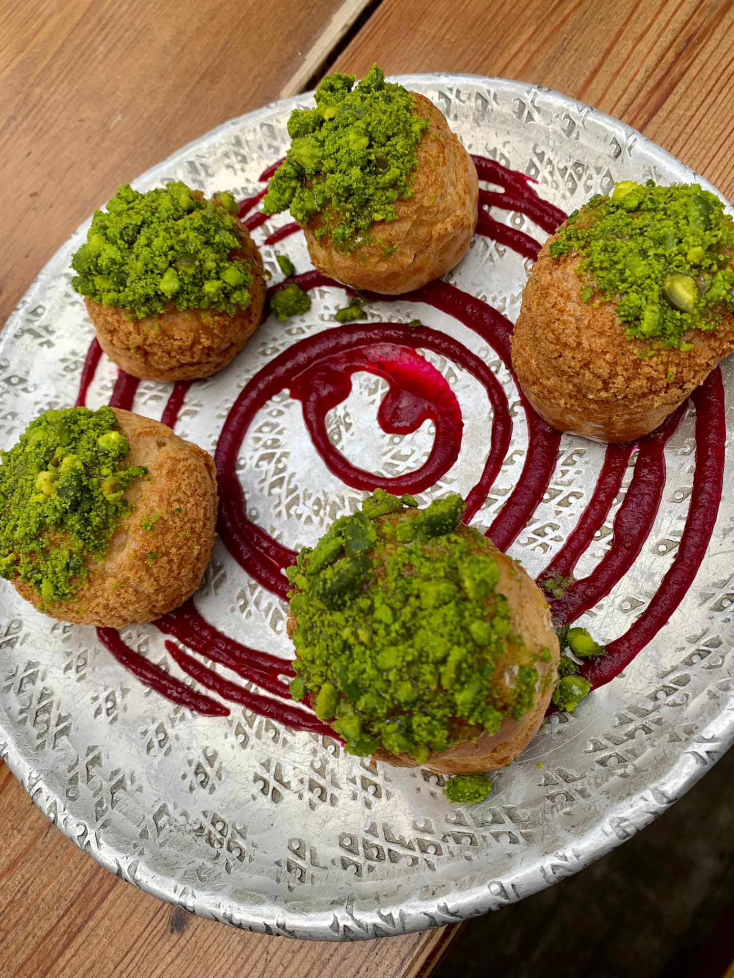 Duck liver profiteroles with pistachio and honey – at Parlour, London